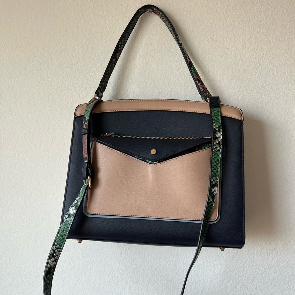 Accessorize handbag with pouch.
